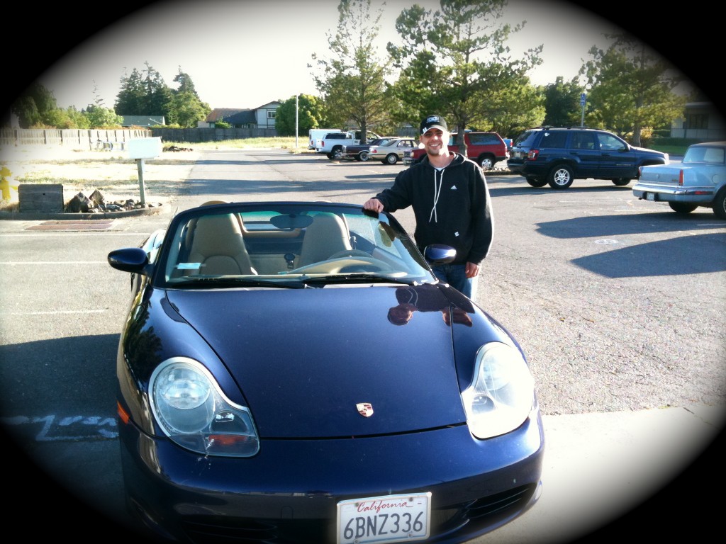 Phil and his new toy...a nice Porsche. 