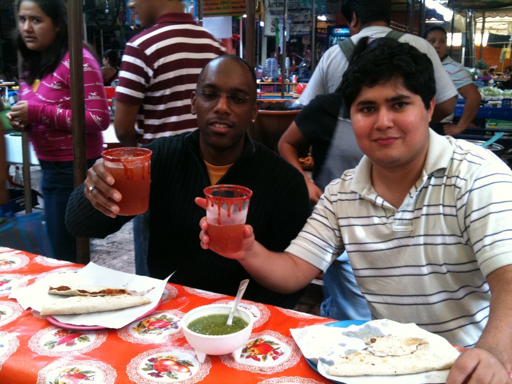 Enjoying street food and cerveza con clamato with Samuel. 